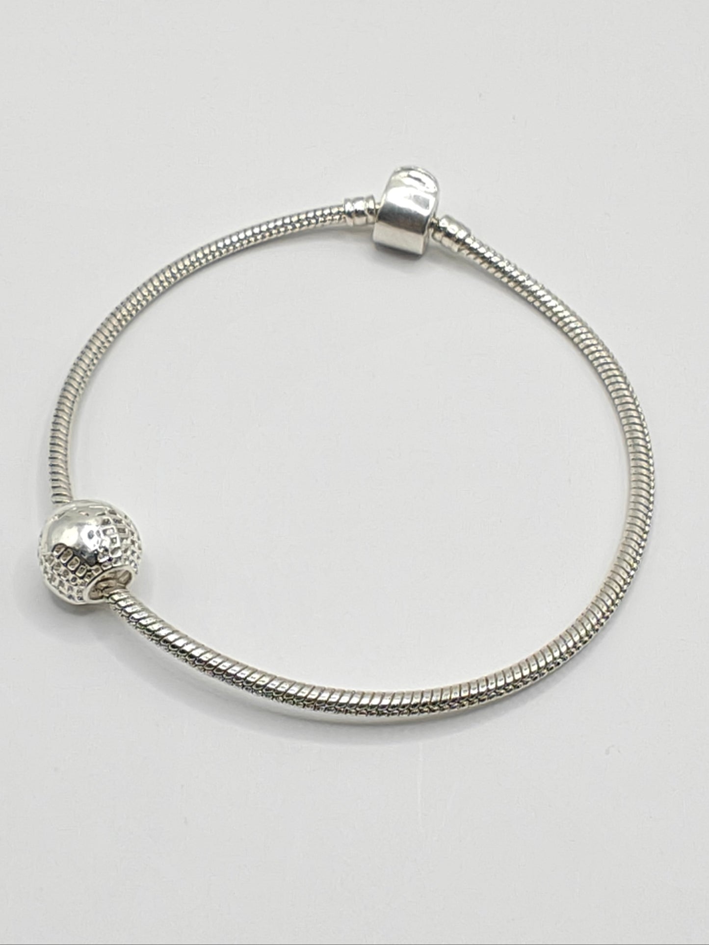 Silver globe charm