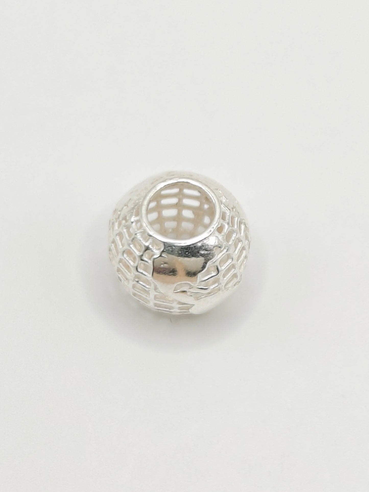 Silver globe charm