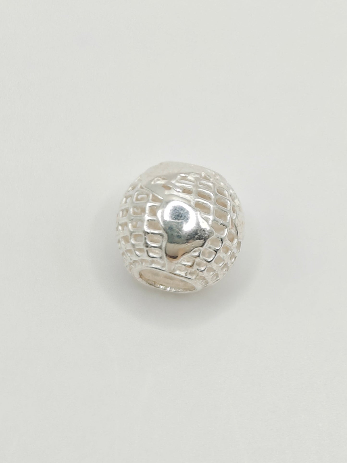 Silver globe charm