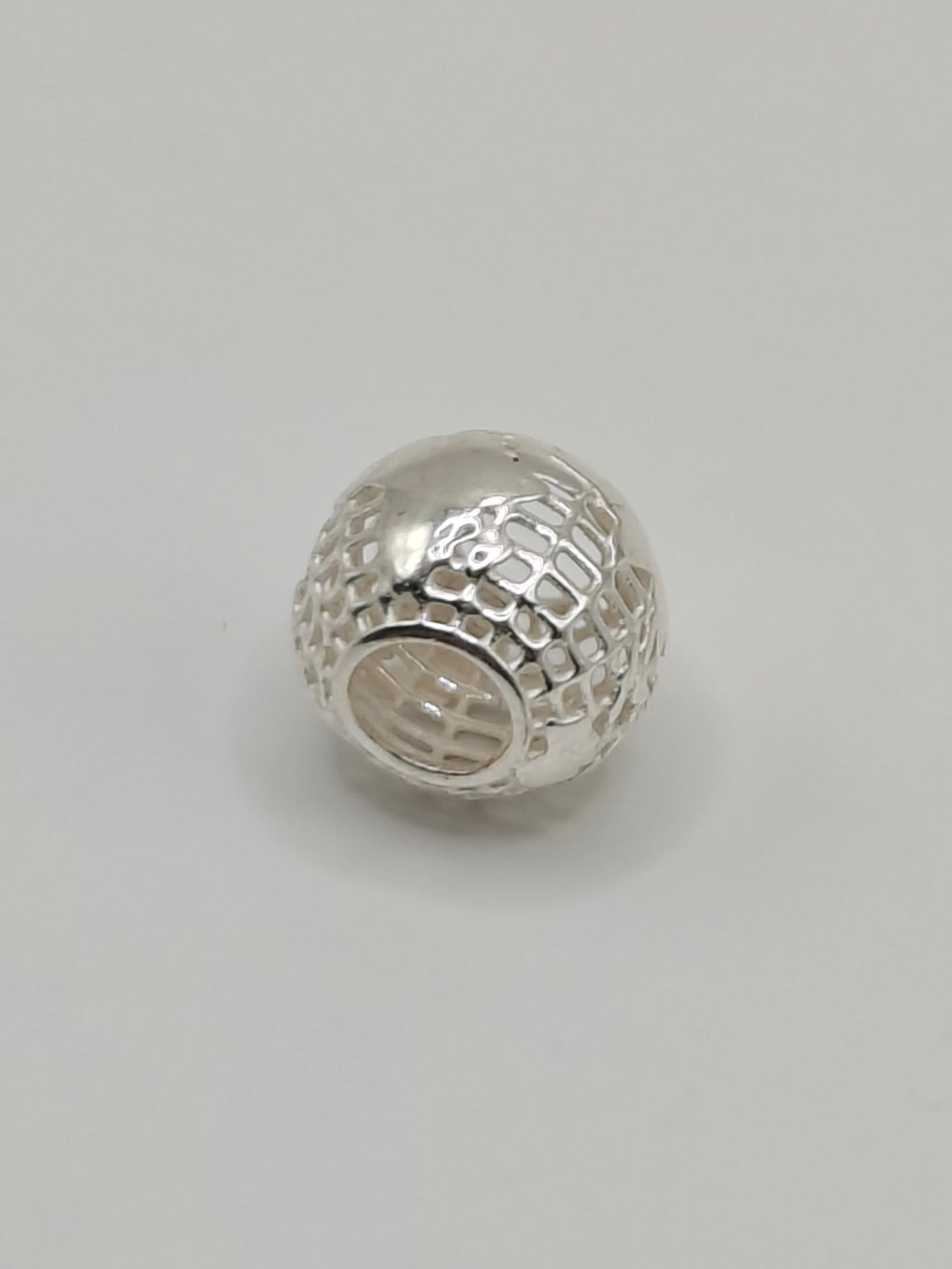 Silver globe charm