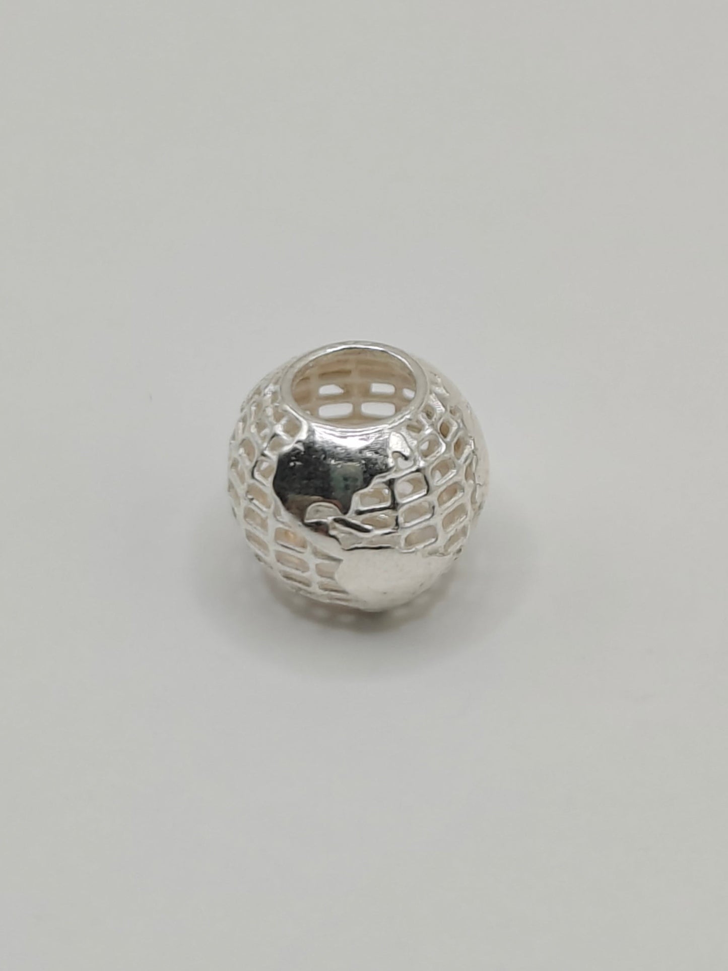Silver globe charm