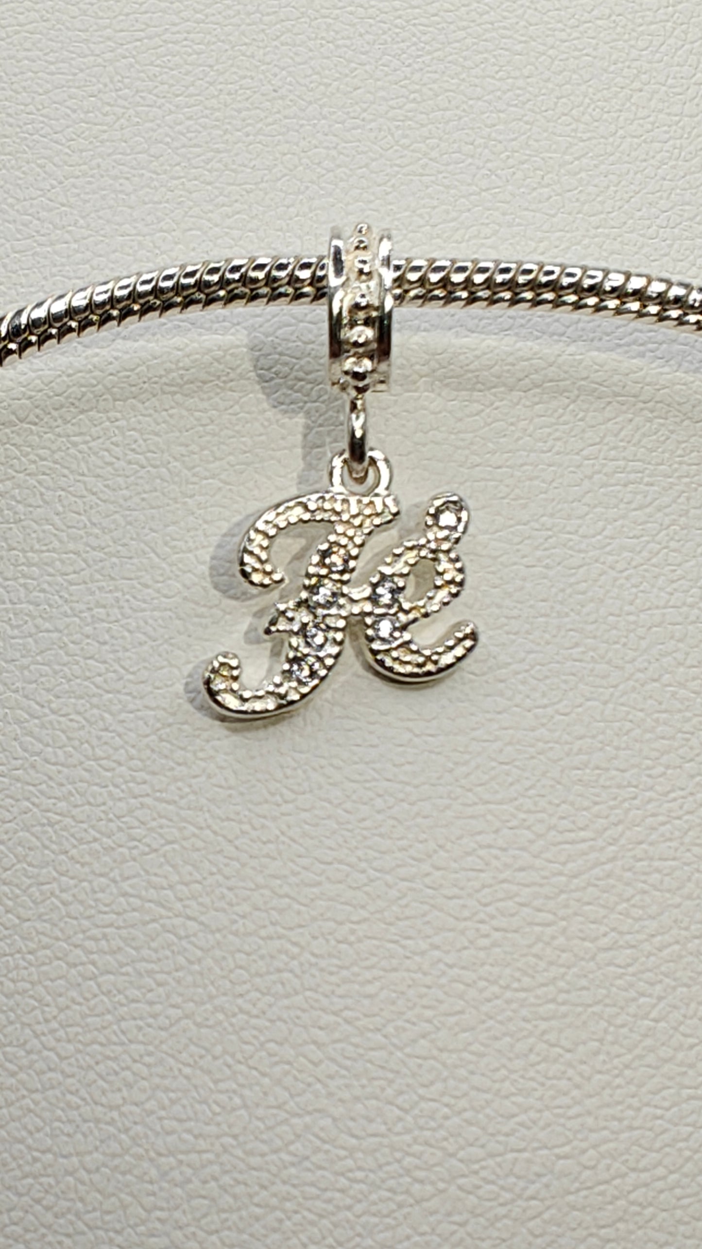 Silver “Fé” Charm