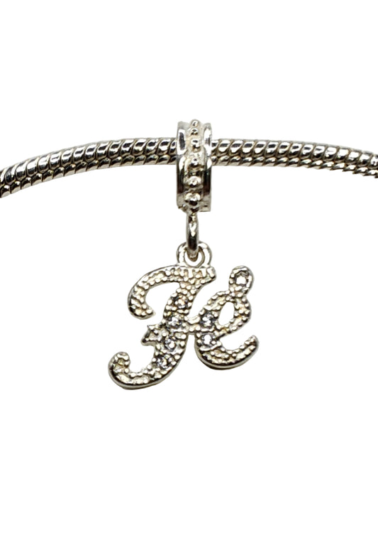 Silver “Fé” Charm