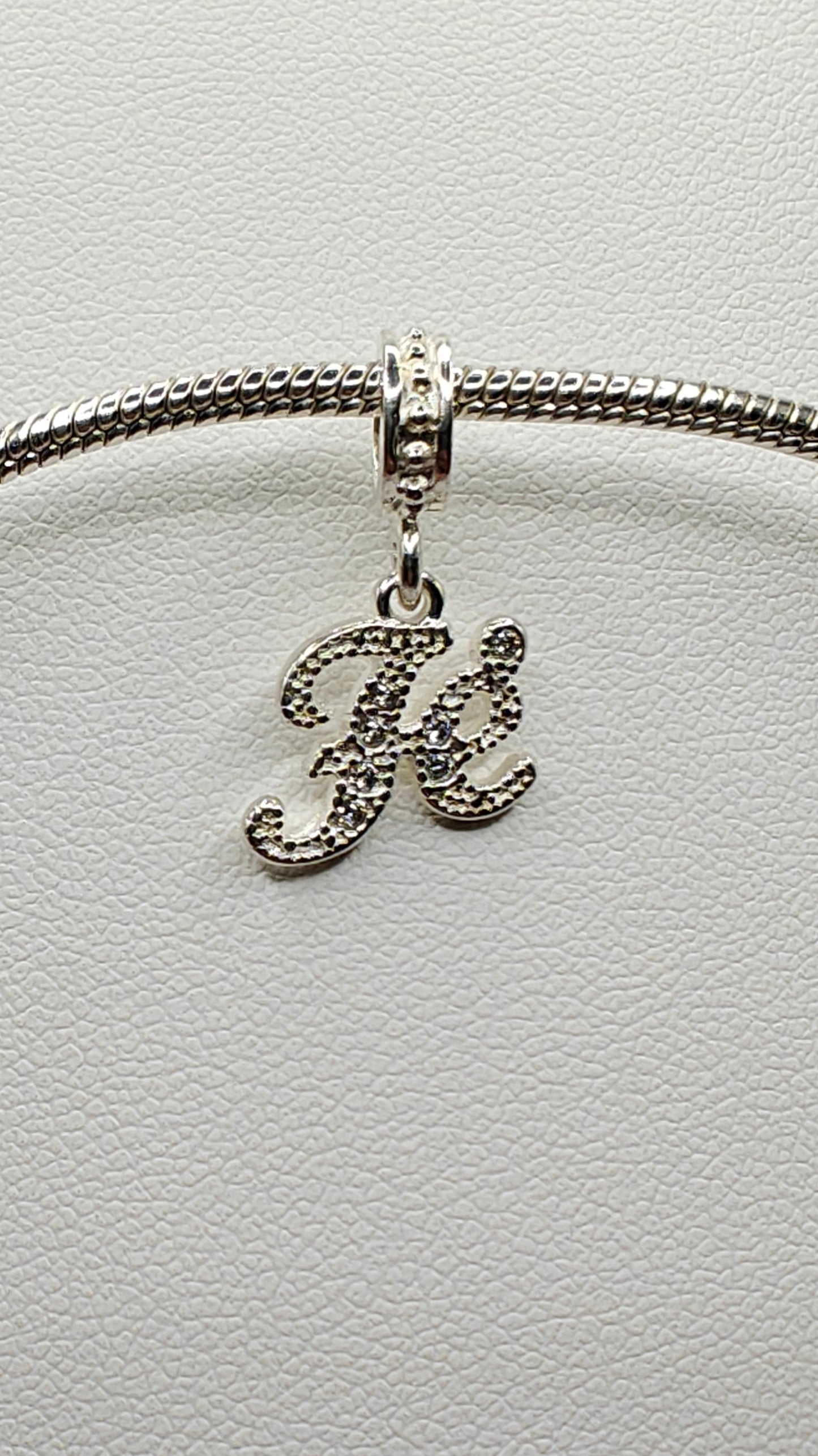 Silver “Fé” Charm